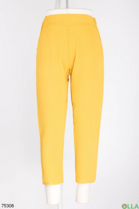Женские желтые брюки