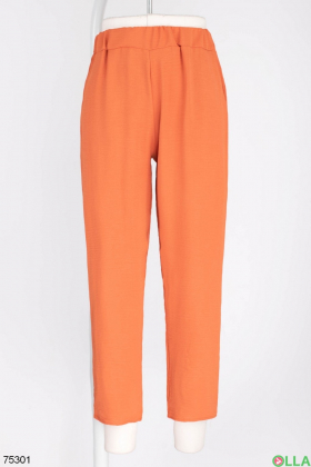 Жіночі помаранчеві брюки