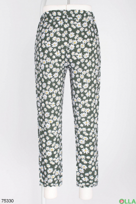 Жіночі двоколірні брюки в квітковий принт