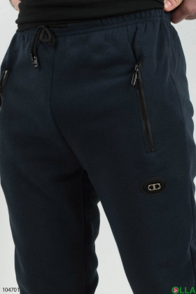 Чоловічі темно-сині спортивні брюки на флісі