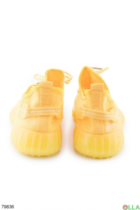 Женские желтые кроссовки из текстиля