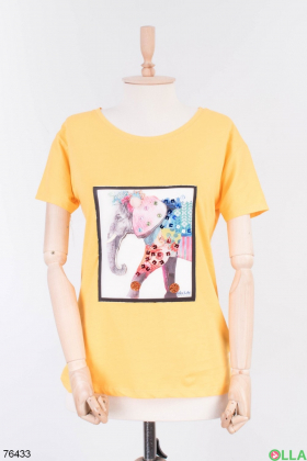 Women's yellow t-shirt with a pattern