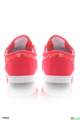 Red slip-on sneakers