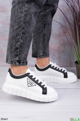 Women's white sneakers with black stripes