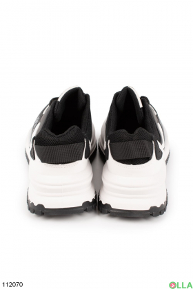 Жіночі чорно-білі кросівки з написом