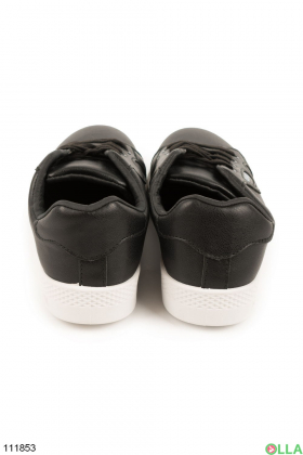 Women's black sneakers made of eco-leather