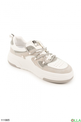 Women's gray and white lace-up sneakers