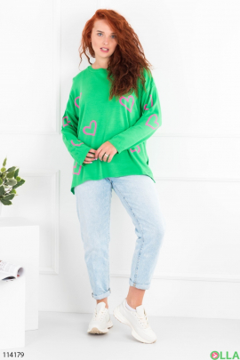 Жіночий зелений светр у принт