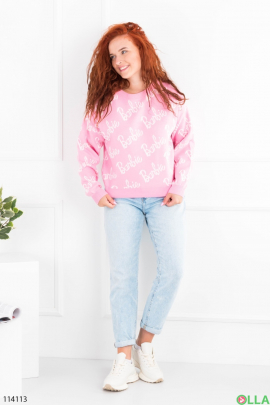 Жіночий рожевий светр у принт