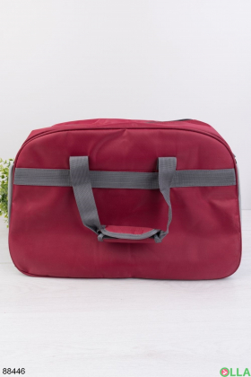 Червона спортивна сумка