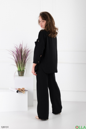 Women's black three-piece suit