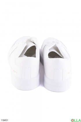 Жіночі білі кросівки на шнурівці