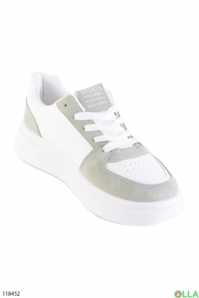 Women's white and green lace-up sneakers