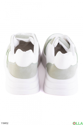 Жіночі біло-зелені кросівки на шнурівці