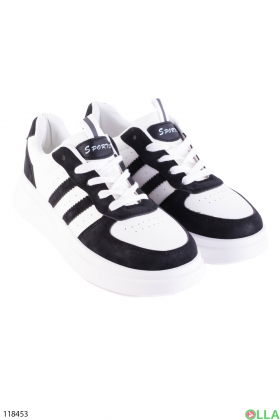 Women's black and white lace-up sneakers
