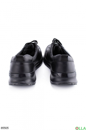 Мужские черные кроссовки из эко-кожи