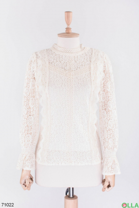 Women's light beige blouse with lace