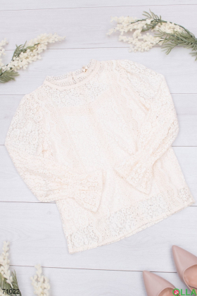 Women's light beige blouse with lace