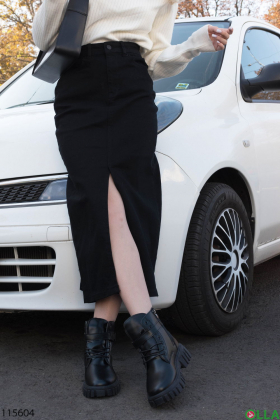 Women's black denim skirt with a slit