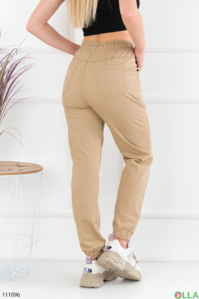 Жіночі бежеві брюки-джоггери
