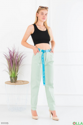 Women's turquoise banana pants with belt
