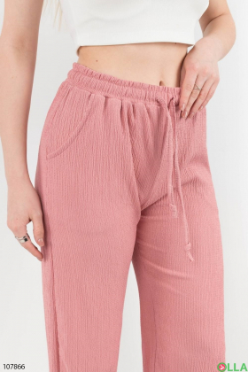 Жіночі рожеві брюки