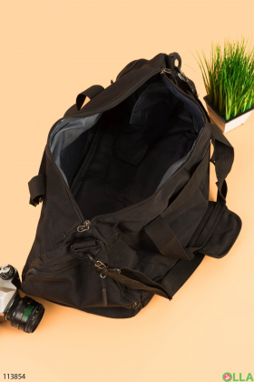 Спортивна чорна сумка з текстилю.