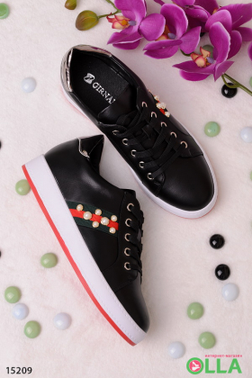 Sneakers decorated with beads