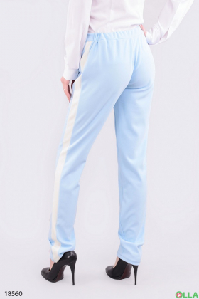 Женские голубые брюки с лампасами
