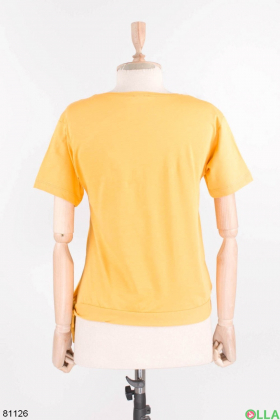 Women's orange t-shirt with a pattern
