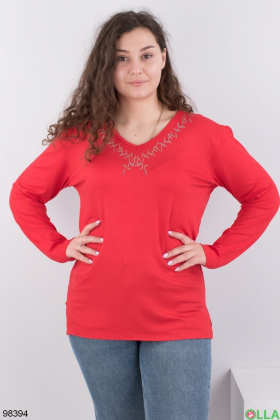 Women's red sweater with decor