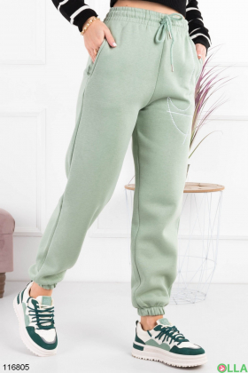 Жіночі зелені спортивні брюки-джогери на флісі