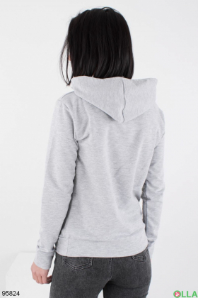 Women's light gray hoodie with slogan
