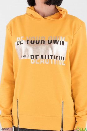 Women's orange hoodie with slogan