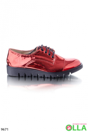 Red lace-up shoes