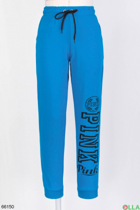 Женские голубые спортивные брюки с надписью