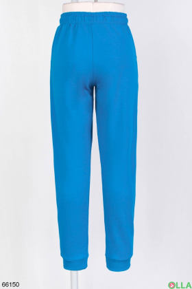 Женские голубые спортивные брюки с надписью