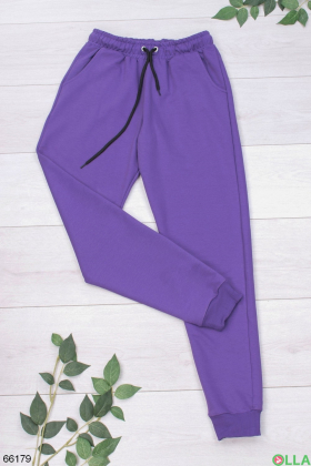 Жіночі спортивні штани фіолетового кольору