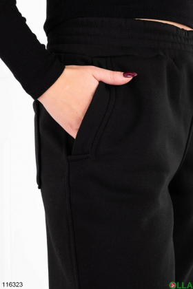 Жіночі утеплені чорні спортивні брюки батал