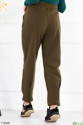 Жіночі утеплені спортивні брюки батал кольору хакі