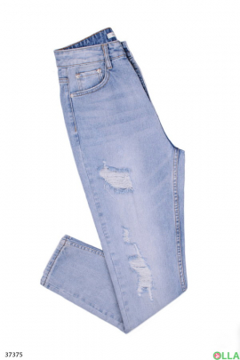 Жіночі джинси з порізами