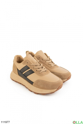 Women's beige sneakers with black inserts