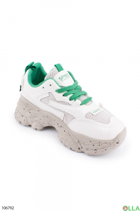 Жіночі білі кросівки із зеленими шнурками