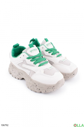 Жіночі білі кросівки із зеленими шнурками