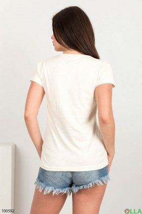 Жіноча світло-бежева футболка з написом