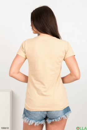 Жіноча бежева футболка з малюнком