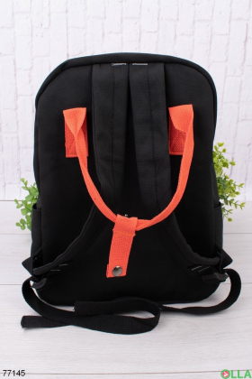 Жіночий чорно-помаранчевий рюкзак з принтом