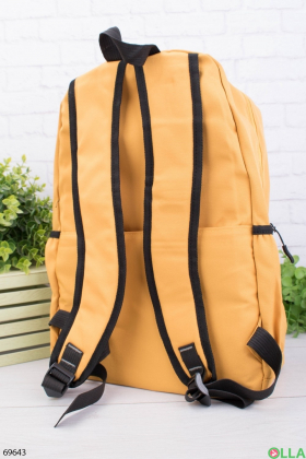 Жіночий жовтий рюкзак з принтом