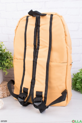 Жіночий жовтий рюкзак з принтом
