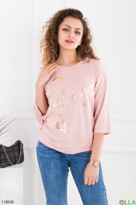 Women's light pink sweater with a pattern